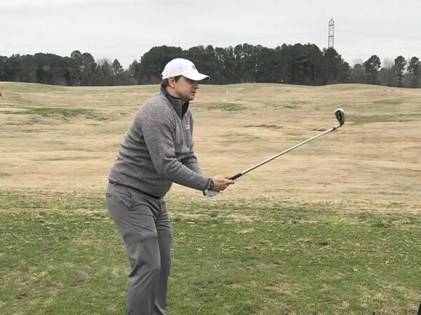 Matthew Underwood playing golf