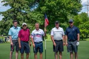 Patrick with veteran support organization friends at a recent Tee It Up for the Troops event. 