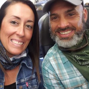 Army veteran Mike Lacy and his wife, Jessica, flying to REUNION with HERO Miles.