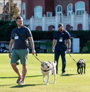 Warriors Rob and Richard attended REUNION 2023 with their service dogs Monsoon and Jersey.