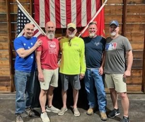 Combat Marines reunited. Pictured left to right are: Patrick Holland, Ron Rowe, Paul Malley, Jeff Hoffman, and Jeff Monssen.