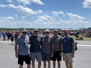 The band of brothers visiting a nearby air show. 